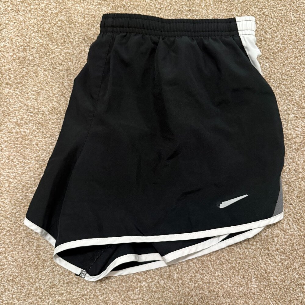 Nike Dri-Fit black women's shorts with white/gray stripe on side, XL